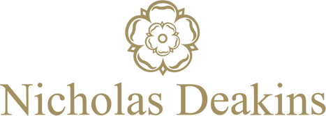 Nicholas Deakins logo